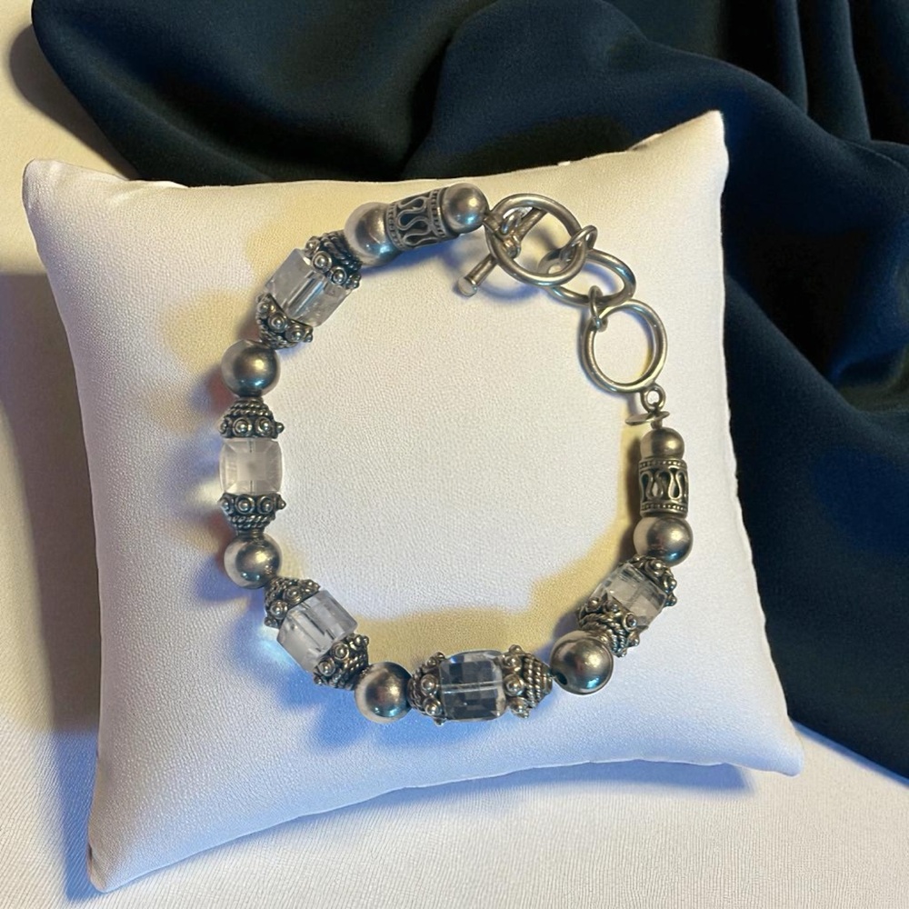 Elegant Sterling Silver and Crystal Bracelet, with adjustable clasp.